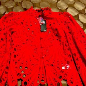 Photos do no justice beautiful red top, never worn.